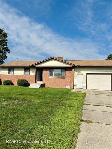 front view picture of 12066 Oak Street, Birch Run, MI. 48415