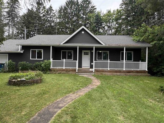 front view picture of 229 N Water Street, Au Gres, MI. 48703