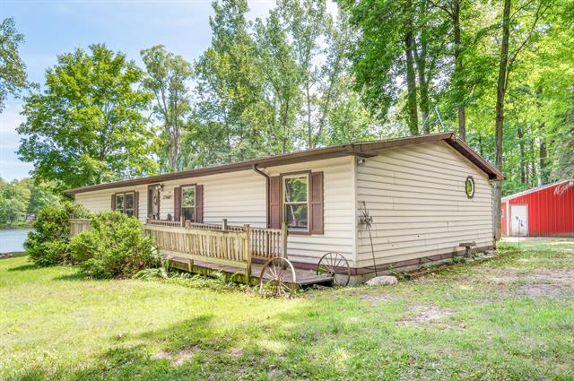 front view picture of 7746 N Manitonka Drive, Weidman, MI. 48893