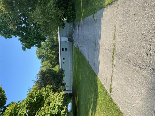 front view picture of 1979 W Riverside Drive, Ionia, MI. 48846