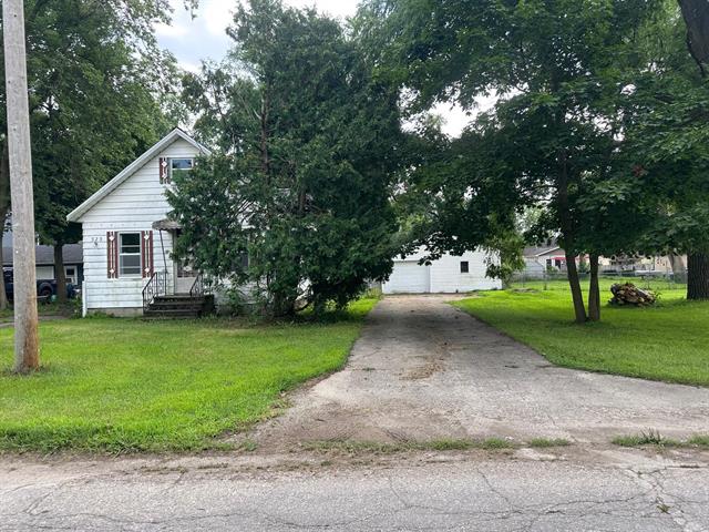 front view picture of 323 Grand Street, Michigan Center, MI. 49254