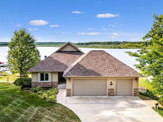 front view picture of 11725 Wabasis Lake Drive Ne, Greenville, MI. 48838