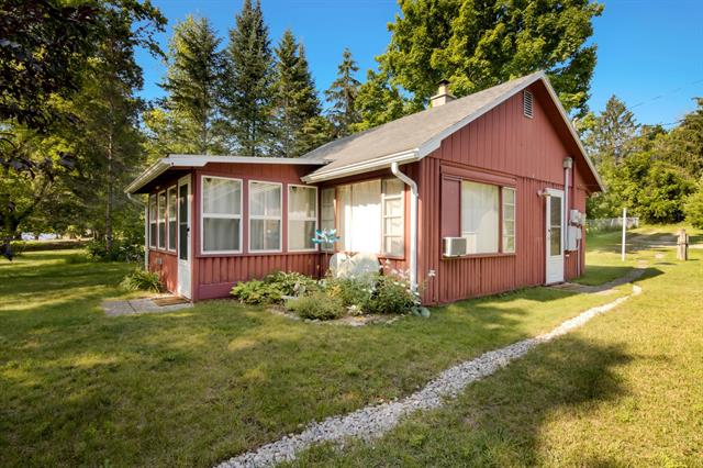 front view picture of 7756 E Maple Street, Central Lake, MI. 49622