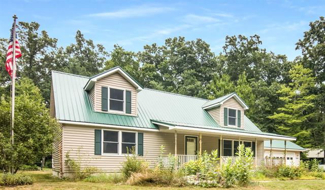 front view picture of 8964 W Elbow Drive, Irons, MI. 49644