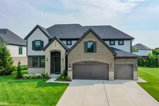 front view picture of 49134 Monarch Drive, Macomb, MI. 48044