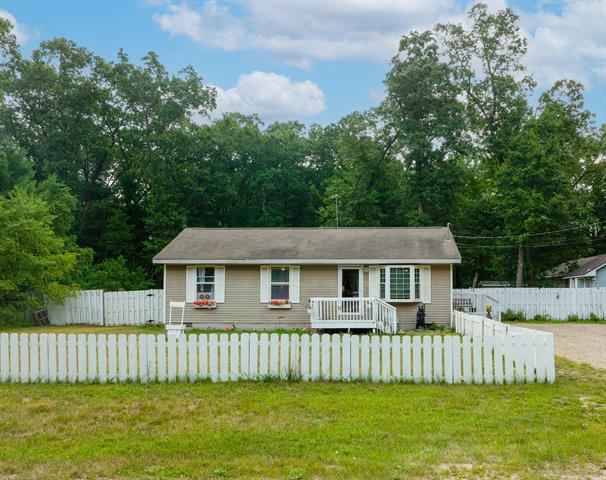 front view picture of 6584 Russell Road, Twin Lake, MI. 49457