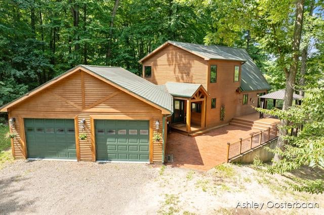front view picture of 12199 Hart Street Ne, Greenville, MI. 48838