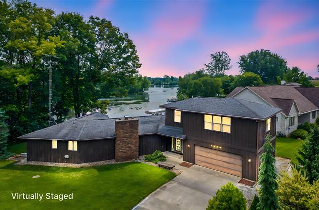 front view picture of 8274 Peninsula Drive, Stanwood, MI. 49346