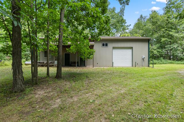 front view picture of 18 W Dick Road, Fenwick, MI. 48834