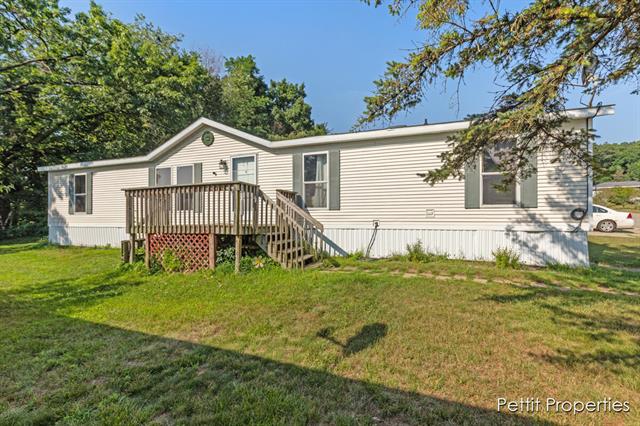 front view picture of 11295 Fay Street Se, Lowell, MI. 49331