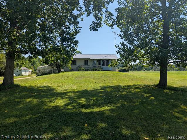 front view picture of 10190 Oak Road, Otisville, MI. 48463