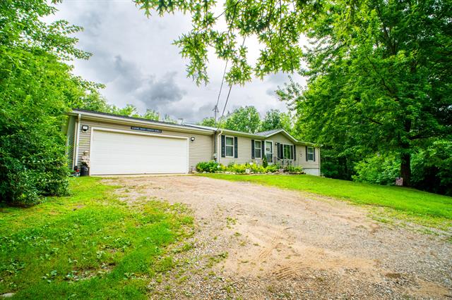 front view picture of 6638 E Territorial Road, Pleasant Lake, MI. 49272