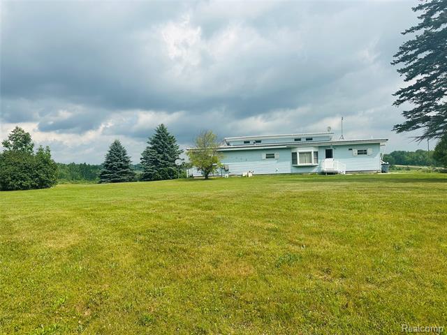 front view picture of 2365 E Haskell Lake Road, Harrison, MI. 48625