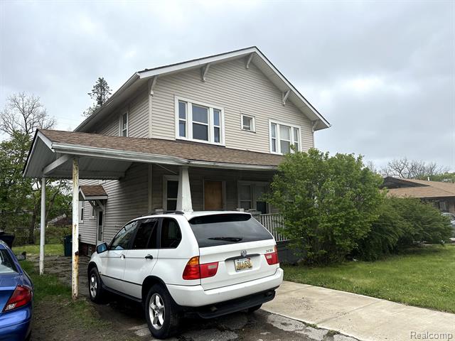 front view picture of 671 W Huron St, Pontiac, MI. 48341