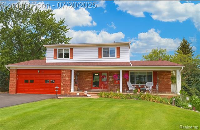 front view picture of 165 Lisa Ct, White Lake, MI. 48386