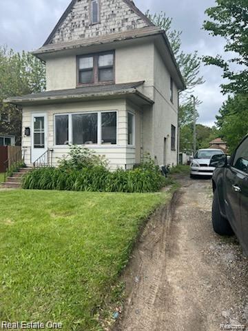 front view picture of 633 N Perry St, Pontiac, MI. 48342
