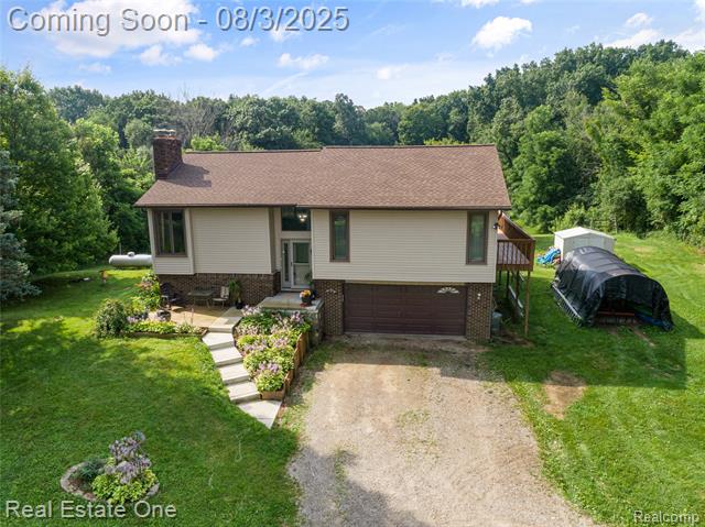 front view picture of 8410 Hitchcock Rd, White Lake, MI. 48383