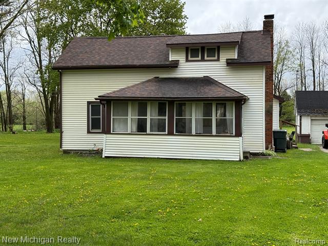 front view picture of 1544 W Rose Center Rd, Fenton, MI. 48430