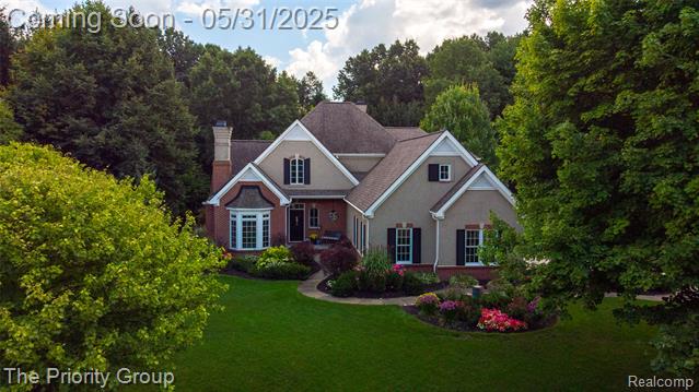 front view picture of 7730 Parkcrest Cir, Clarkston, MI. 48348