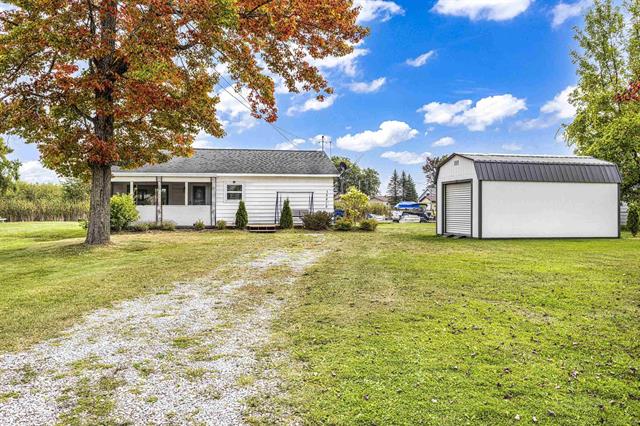 front view picture of 13510 W Shore Drive, Houghton Lake, MI. 48629