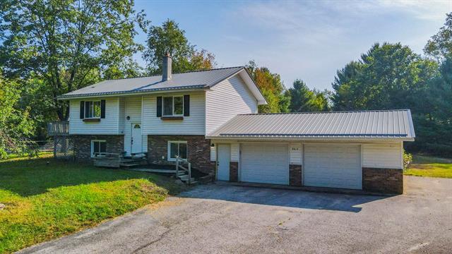 front view picture of 7613 Lake Ann Road, Lake Ann, MI. 49650