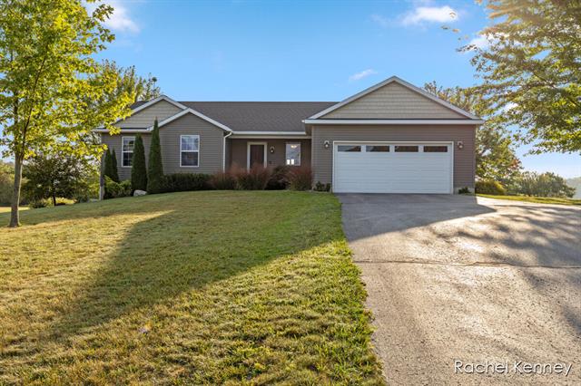 front view picture of 6101 Greenbriar Drive, Lowell, MI. 49331