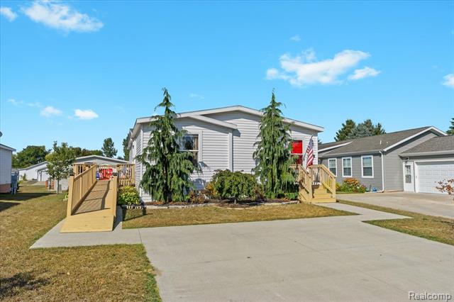 front view picture of 1222 Heather Court, Grass Lake, MI. 49240