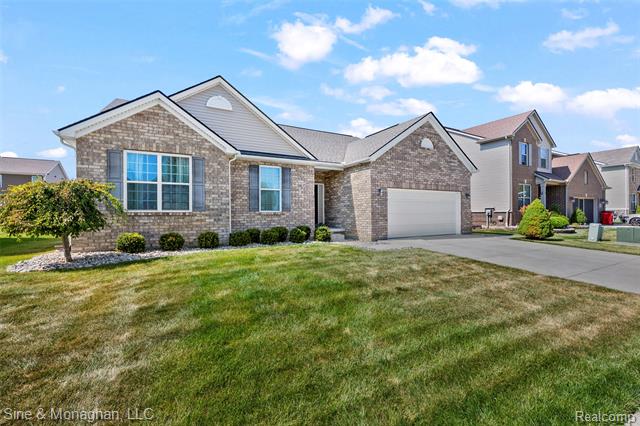 front view picture of 48327 Long Leaf Drive, Macomb, MI. 48044