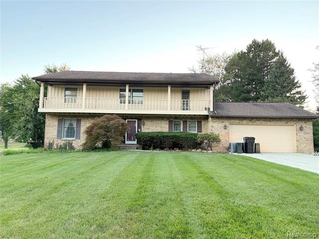 front view picture of 1307 Springborrow Drive, Flint, MI. 48532