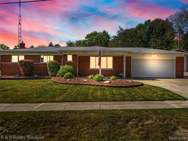 front view picture of 319 Kidder Road, Almont, MI. 48003