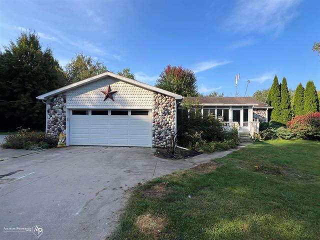 front view picture of 11192 E Lake Road, Otisville, MI. 48463