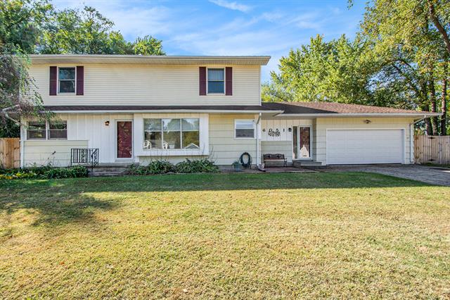front view picture of 6051 Riverside Drive, Jackson, MI. 49201