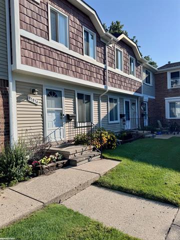 front view picture of 45874 Kensington Street, Utica, MI. 48317