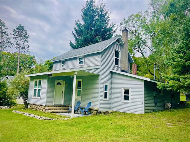 front view picture of 303 N Genessee, Bellaire, MI. 49615