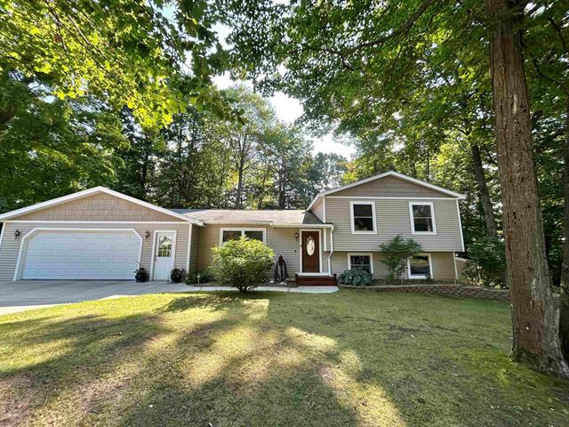 front view picture of 20854 Red Oak Drive, Lake Ann, MI. 49650