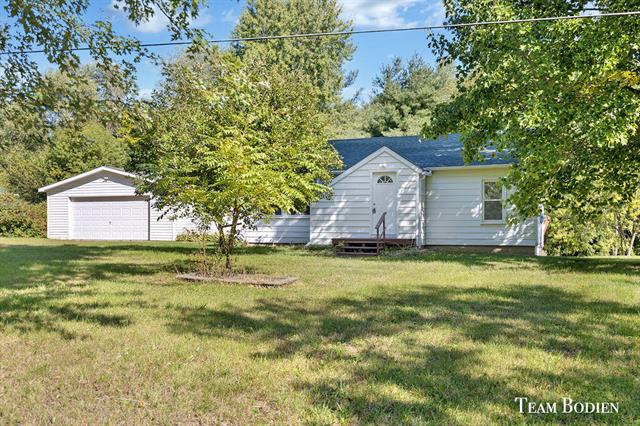 front view picture of 9425 E Church Road, Vestaburg, MI. 48891