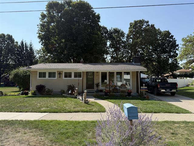 front view picture of 542 Sunset Street, Coopersville, MI. 49404