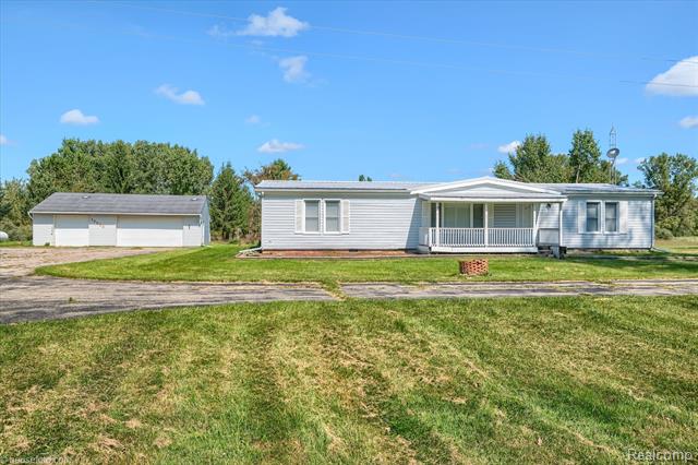 front view picture of 13566 Kaufman Road, Capac, MI. 48014