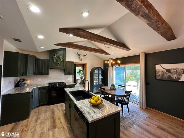 front view picture of 908 Pheasant Run, Gladwin, MI. 48624