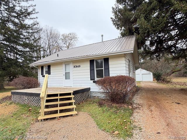 front view picture of 10149 Seymour Road, Montrose, MI. 48457