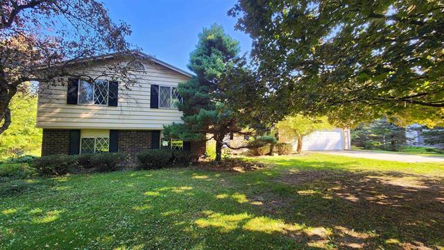 front view picture of 8811 Marr Road, Almont, MI. 48003