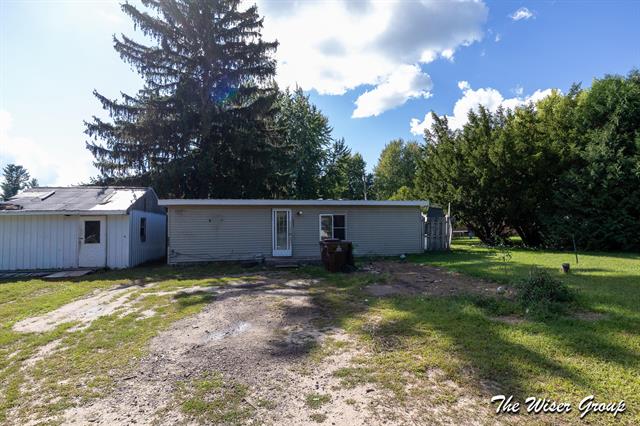 front view picture of 8041 Drake Street, Orleans, MI. 48865
