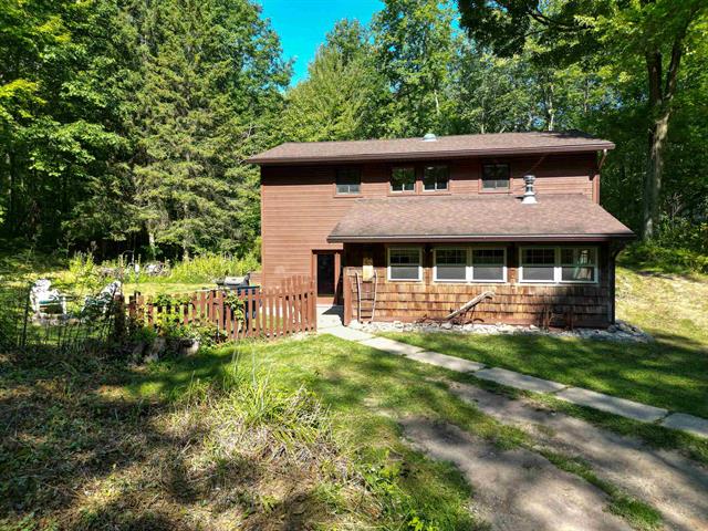 front view picture of 4518 W Vernon Road, Weidman, MI. 48893