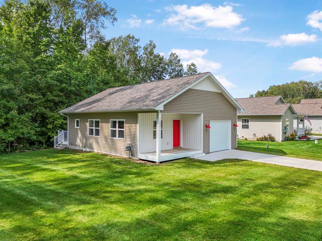 front view picture of 6632 Front Street, Lake Ann, MI. 49650