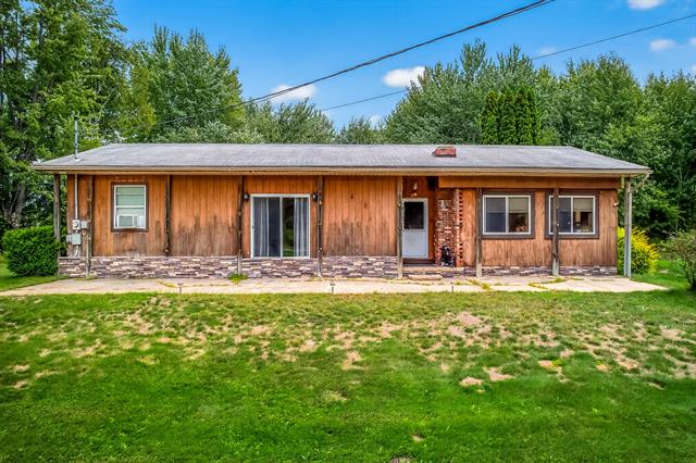 front view picture of 522 S Ravenna Road, Ravenna, MI. 49451