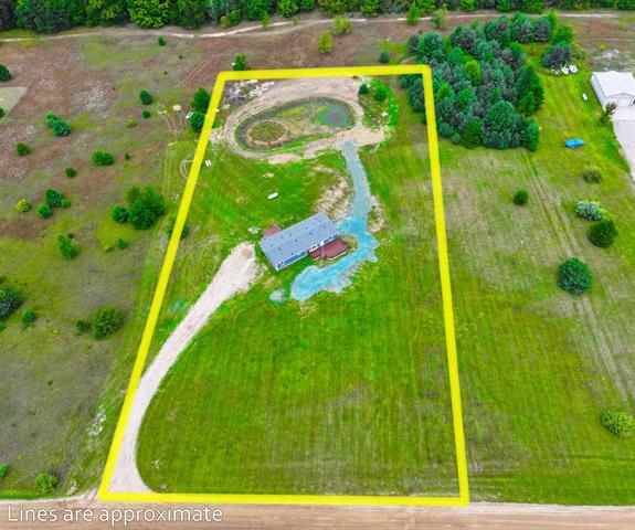 front view picture of 848 Sw Prairie Lane, Kalkaska, MI. 49646