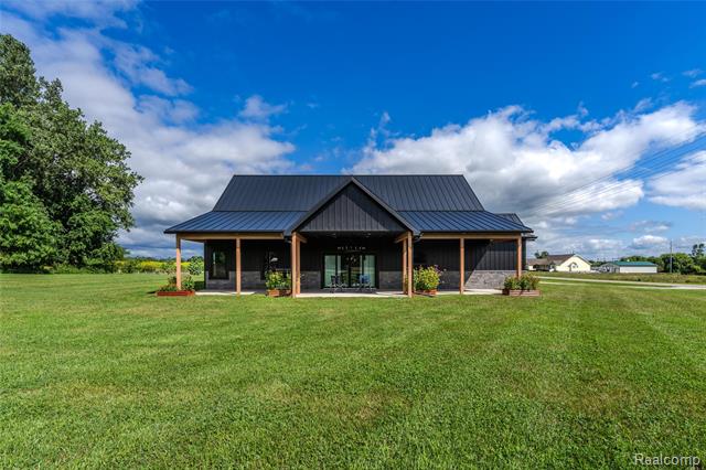 front view picture of 5486 Kidder Road, Almont, MI. 48003