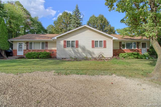 front view picture of 600 Oakville Waltz Road, New Boston, MI. 48164