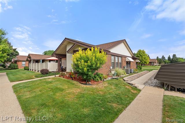 front view picture of 40699 Newport Drive, Plymouth, MI. 48170