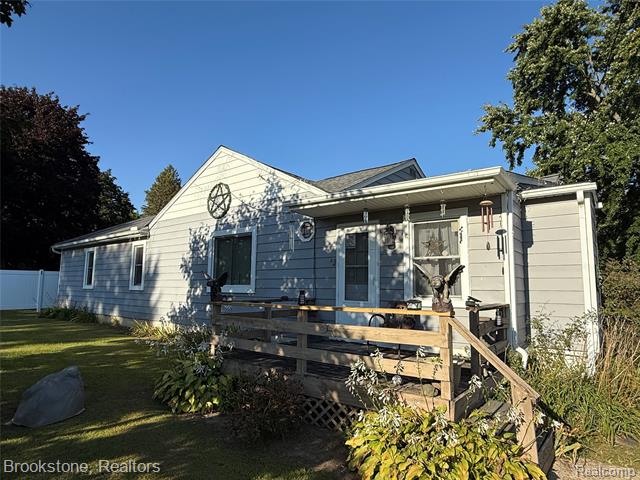 front view picture of 10024 Stover Road, Otisville, MI. 48463